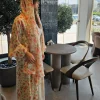 Noor print Abayas Made In UAE in Premium chiffon fabrics with a matching printed Sheila